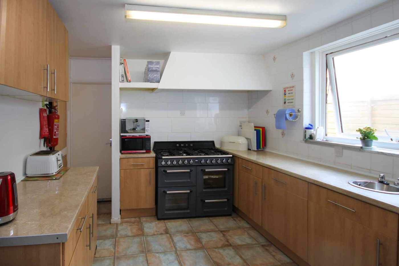 A Turnkey, Easily Operated 7-Bedroom Guesthouse