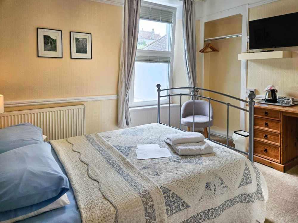 A Stunning Turn-Key Six-Bedroom Guest House with Exceptional Presentation and Strong Profitability