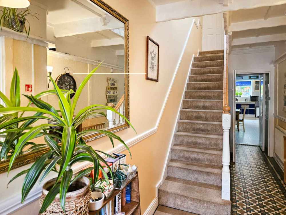 A Stunning Turn-Key Six-Bedroom Guest House with Exceptional Presentation and Strong Profitability
