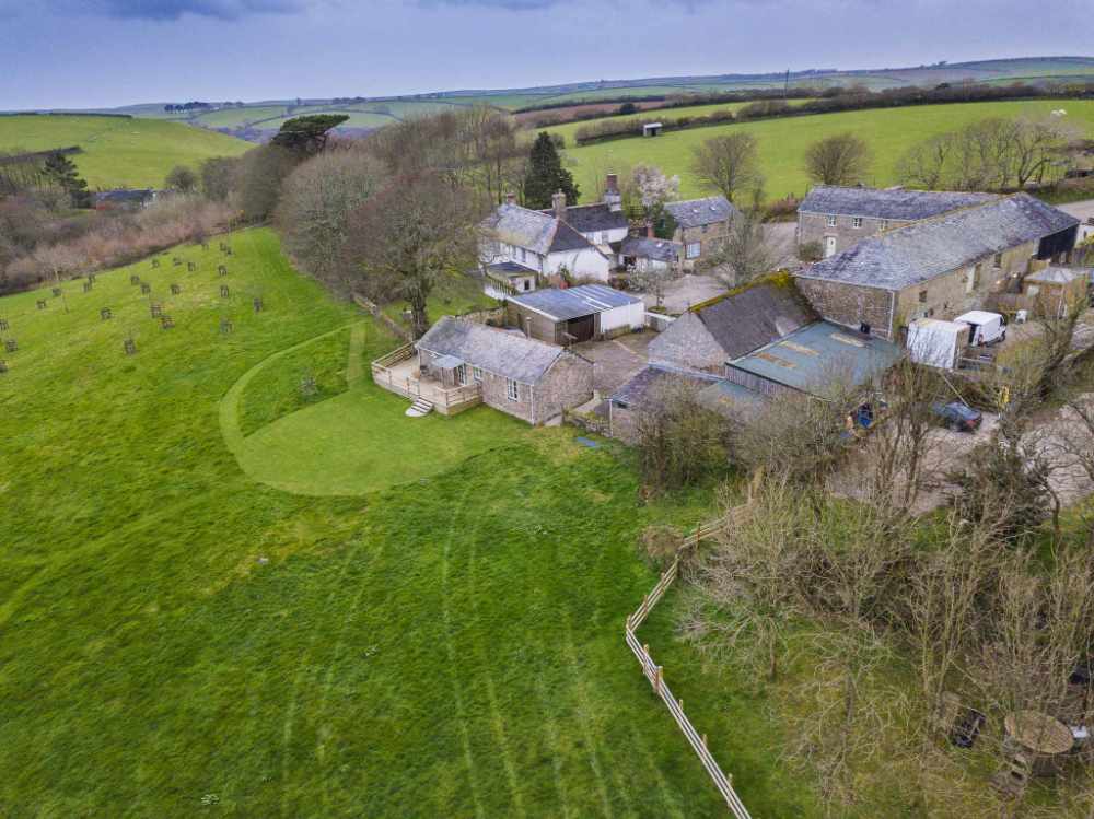 Exceptional Farm Holiday Cottage Complex with Events /Wedding Venue Potential, Camping & Glamping Facilities — Set Within 15 Acres with a Private Lake and Much More