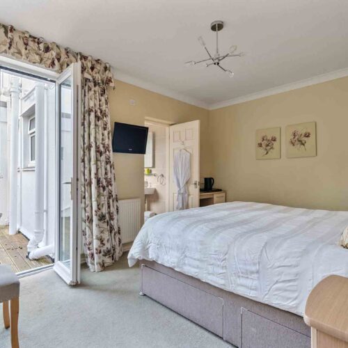 Hotel for sale in Carbis Bay, Cornwall - A beautifully presented detached 9-bedroom en-suite guest house