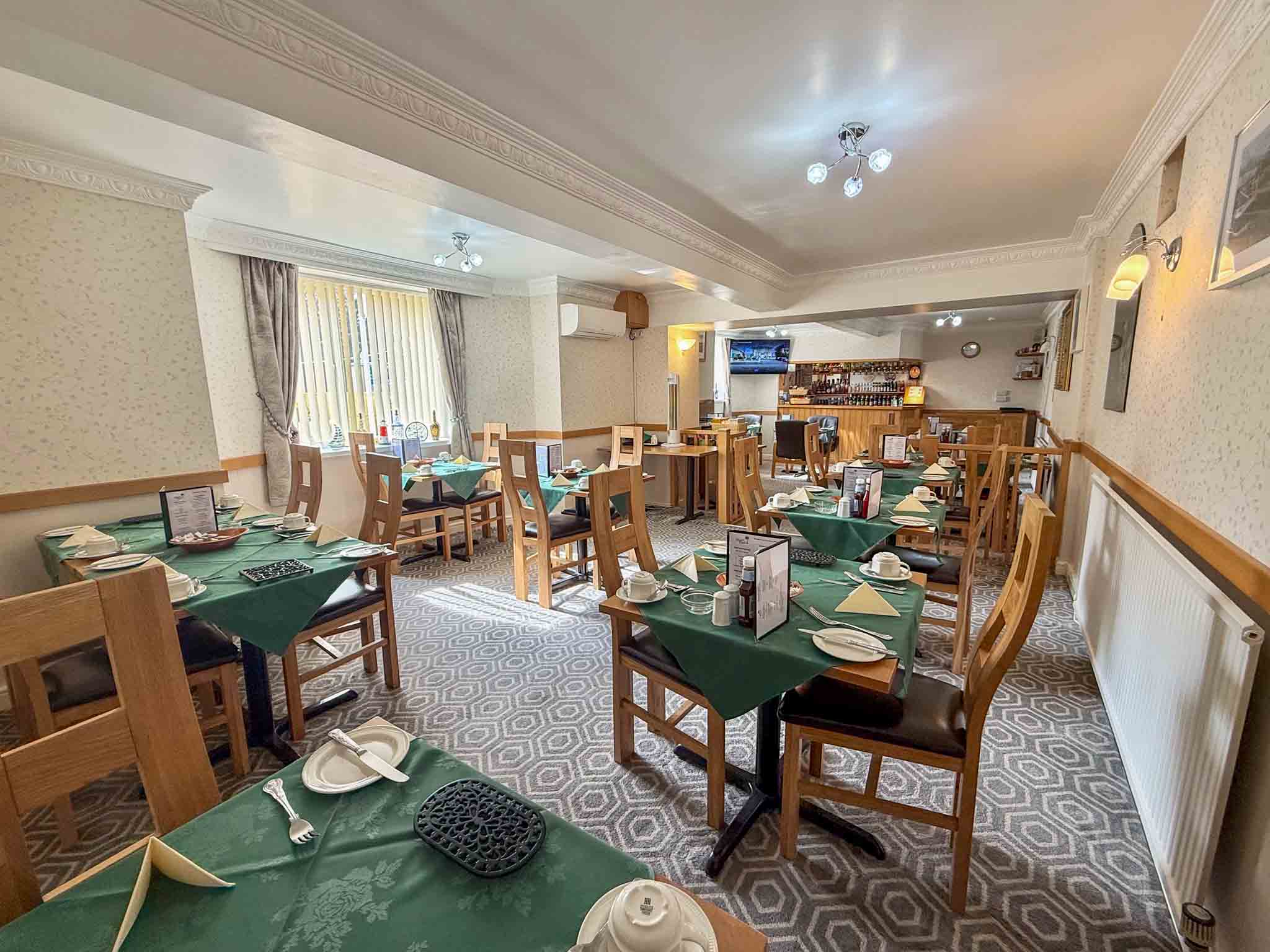 Profitable 15-Bedroom En-Suite Hotel Near Beach & Town Centre