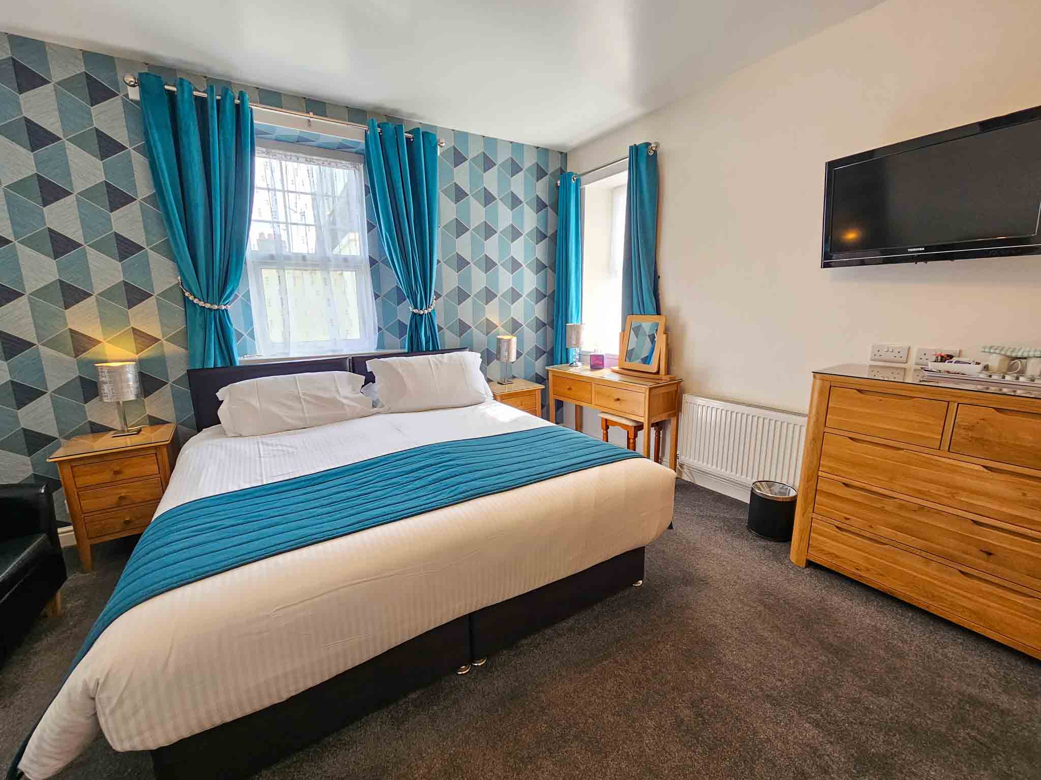 Profitable 15-Bedroom En-Suite Hotel Near Beach & Town Centre